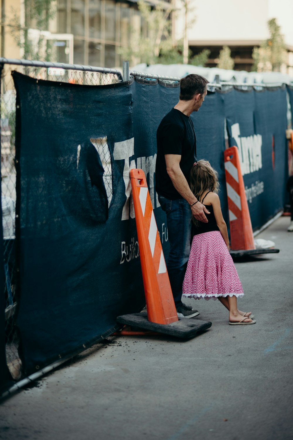 man standing behind of girl