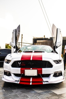 white and red Ford Mustang