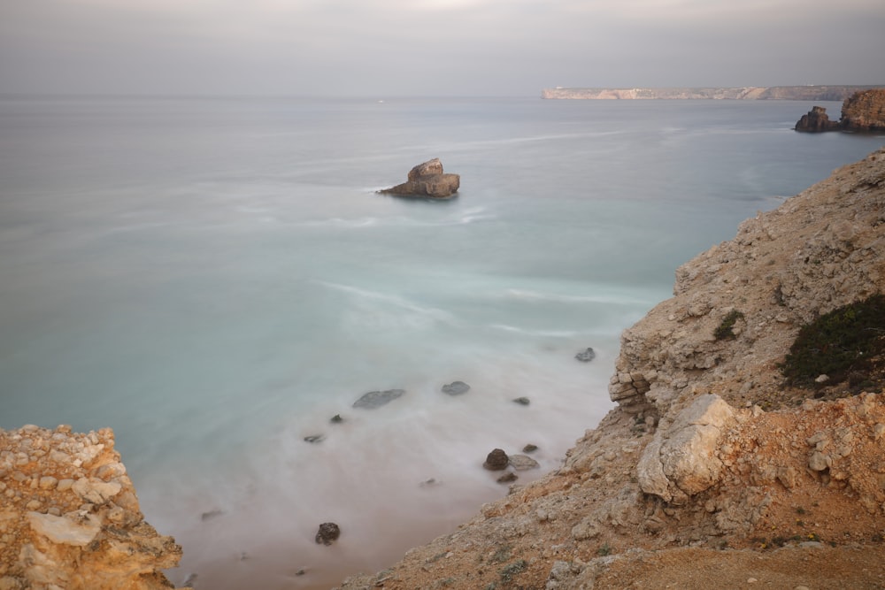 aerial photography of blue sea from a cliff