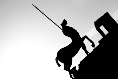 Illustration of a centaur archer aiming an arrow at the stars.