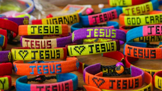 assorted silicon bands on brown surface