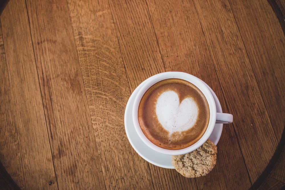 heart coffee art with cookie