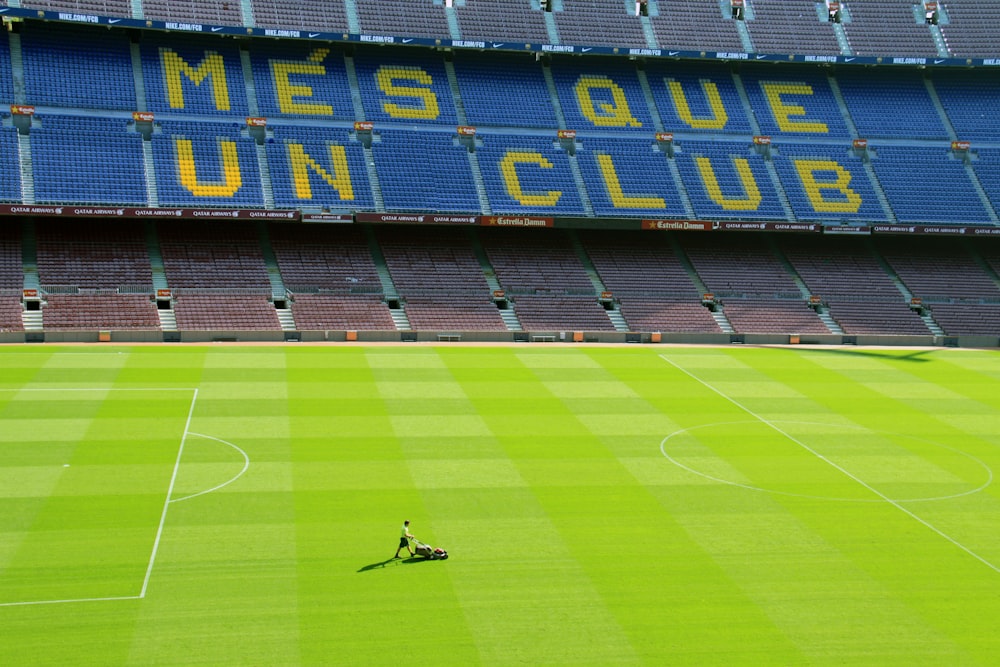 person standing on football field