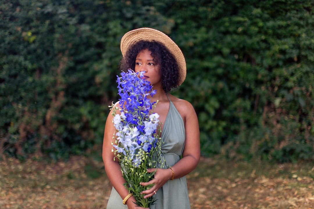 woman carrying flowers