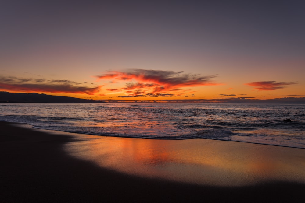 sea and seashore at golden hour