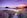 brown wooden dock between lavender flower field near body of water during golden hour
