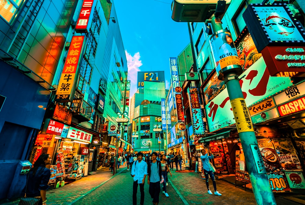 people walking between buildings