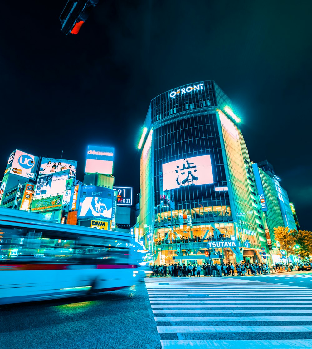 time-lapse photography of people crossing street during nighttime