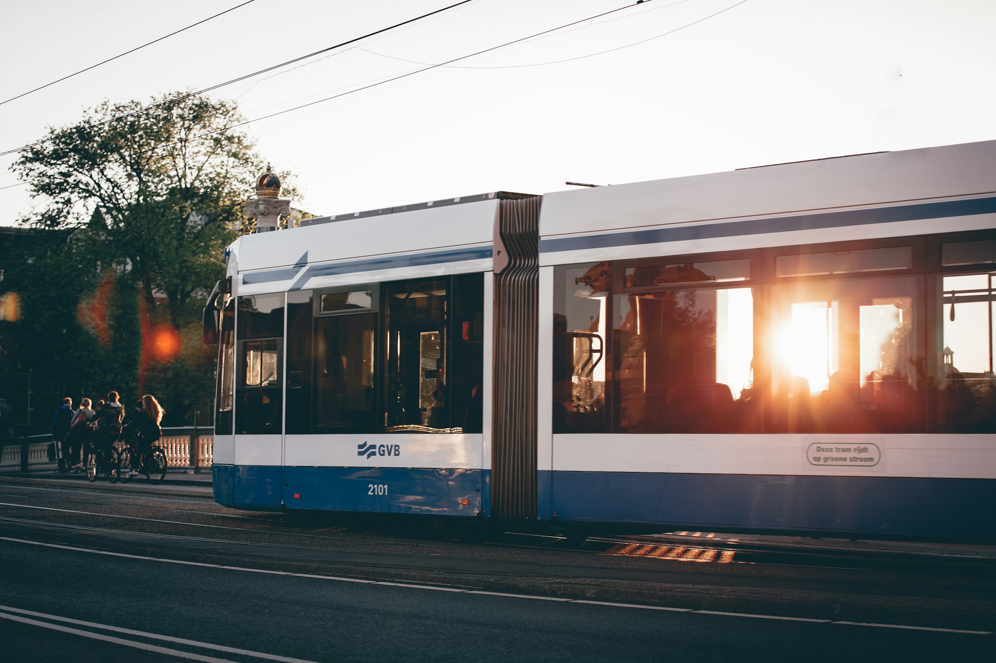 A typical view in Amsterdam, the tram crossing the Blauwbrug in Amsterdam. I was walking through the beautiful city of Amsterdam during sunset when I created this picture.