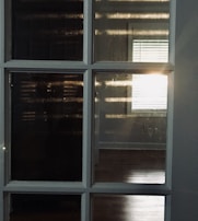 Sunlight streaming through windows illuminating modern manufacturing equipment.