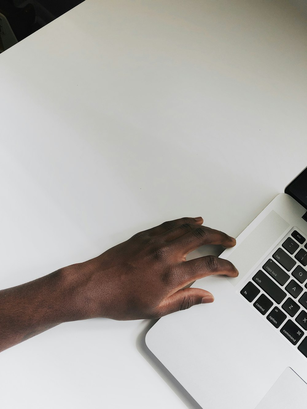 person in front of laptop computer