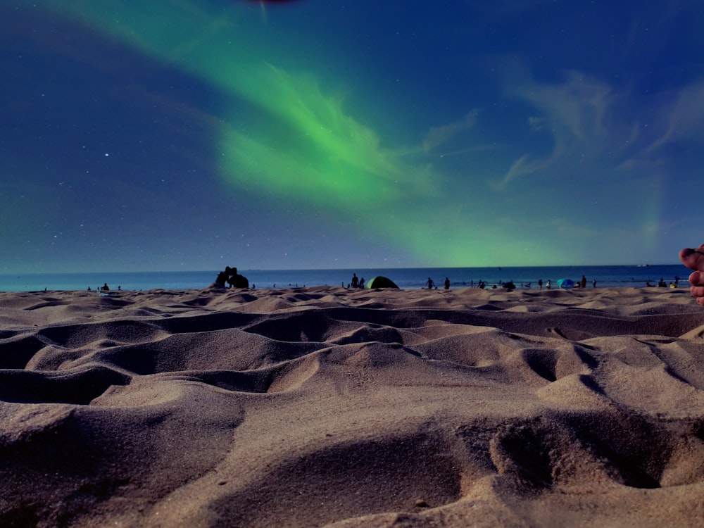 close up photography of sand at beach