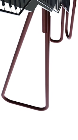 An elegant industrial furniture piece made of dark steel.