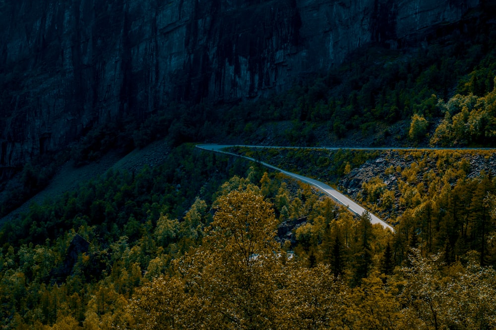 empty road near mountain at daytime