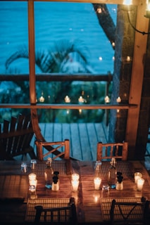 white candles on brown wooden table