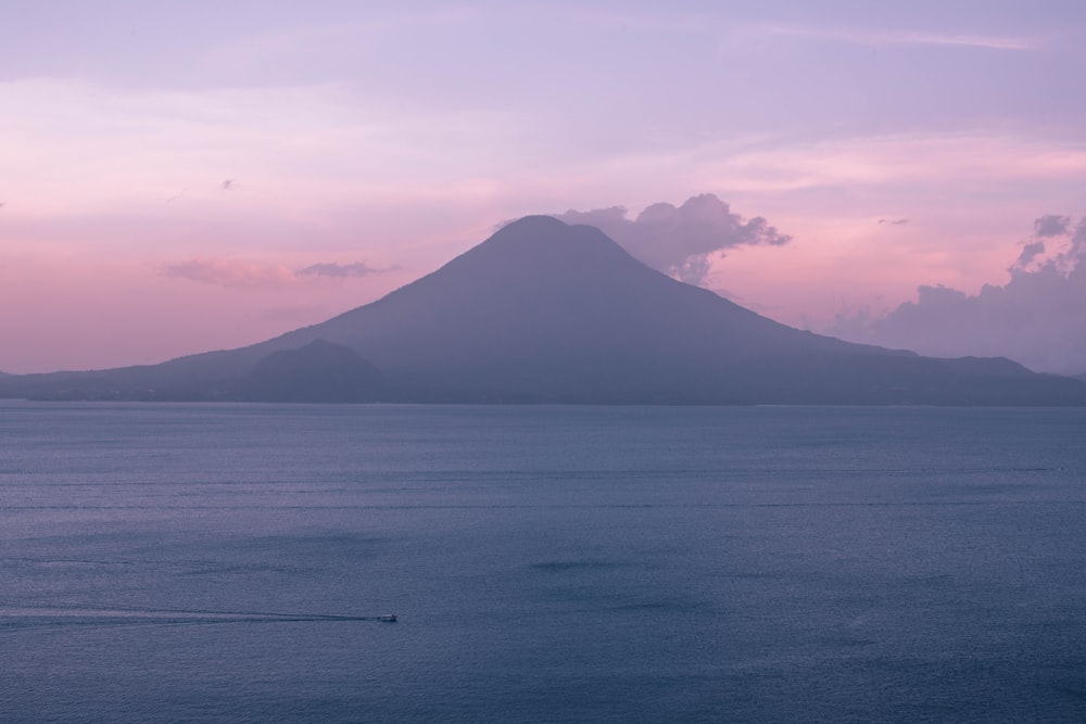 mountain near body of water