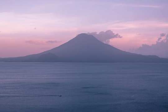 mountain near body of water in Lake Atitlán Guatemala
