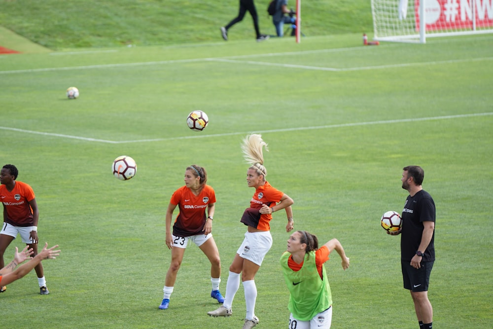 group of women playing soccer