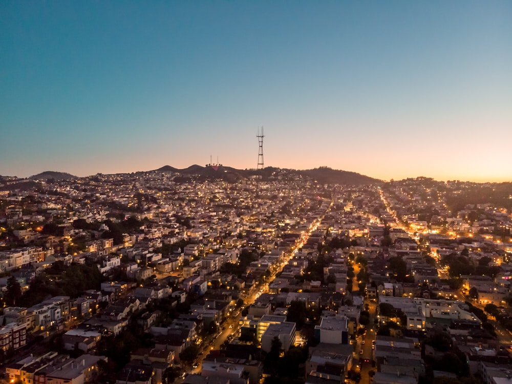 aerial view of city under blue sky during daytime