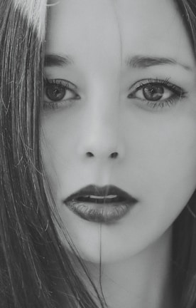 Close-up of a black African girl with long, sleek straight human hair styled elegantly