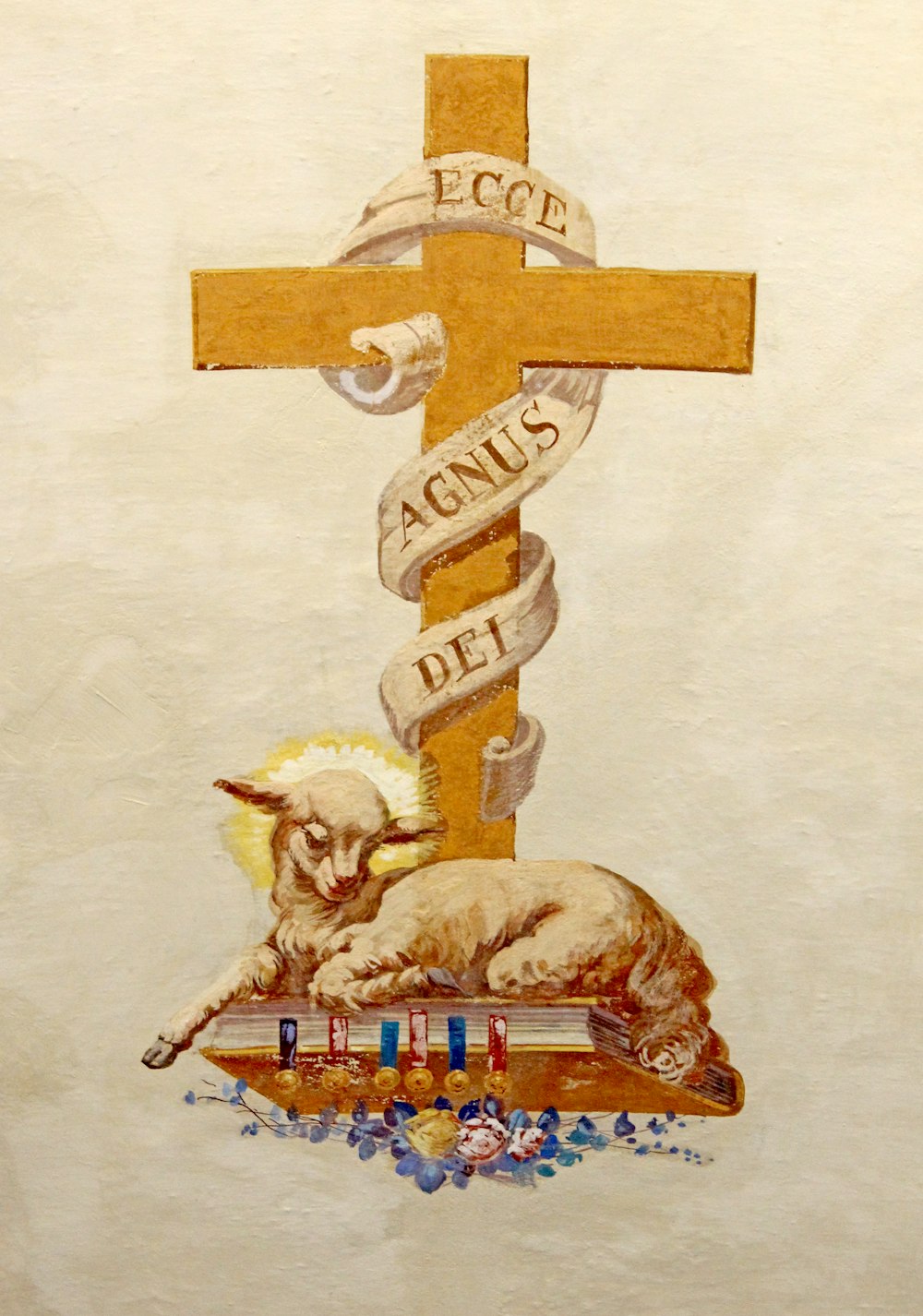 lamb on bible under cross illustration