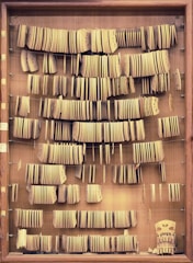 Close-up of handcrafted wooden parts arranged neatly on a table.