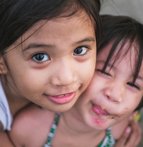 girl hugging girl from back