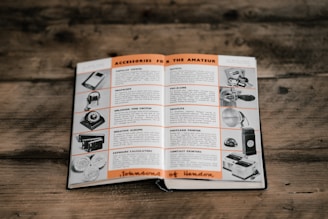 opened book laid in brown table