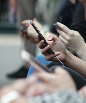 person holding black phone