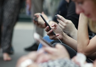 person holding black phone