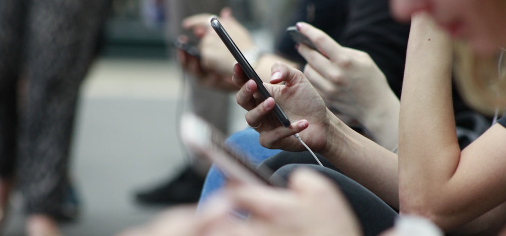 person holding black phone