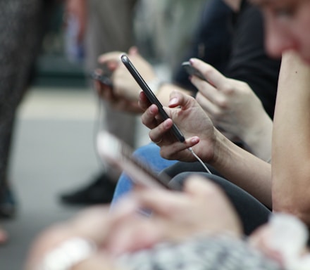 person holding black phone