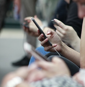 person holding black phone