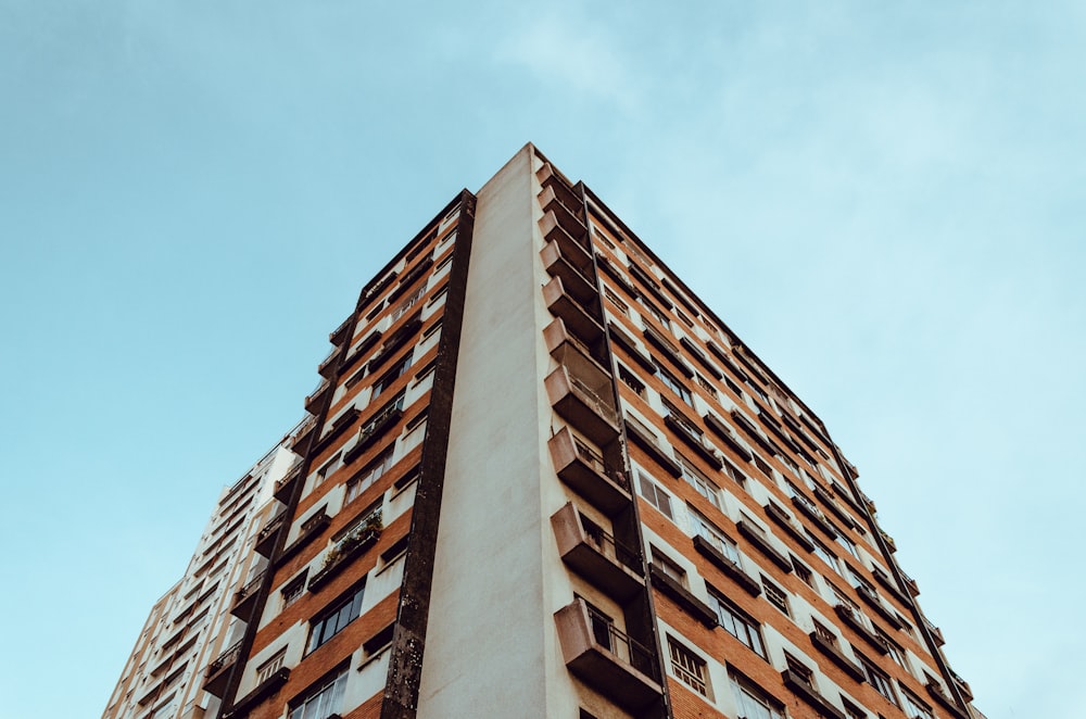 worm's-eye view of brown building