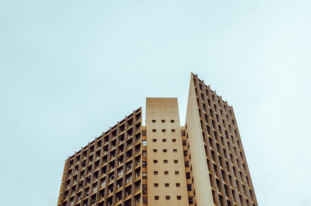 low angle photography on brown building