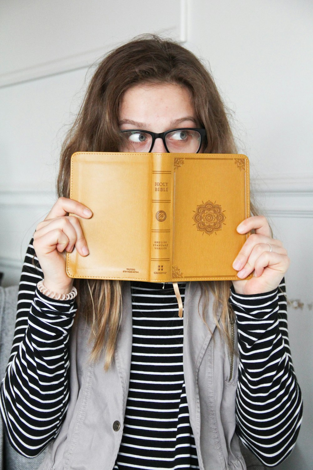 person holding book