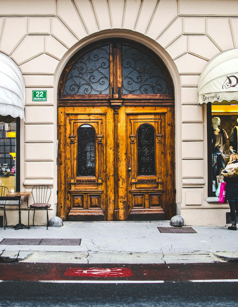 brown wooden door of boutique