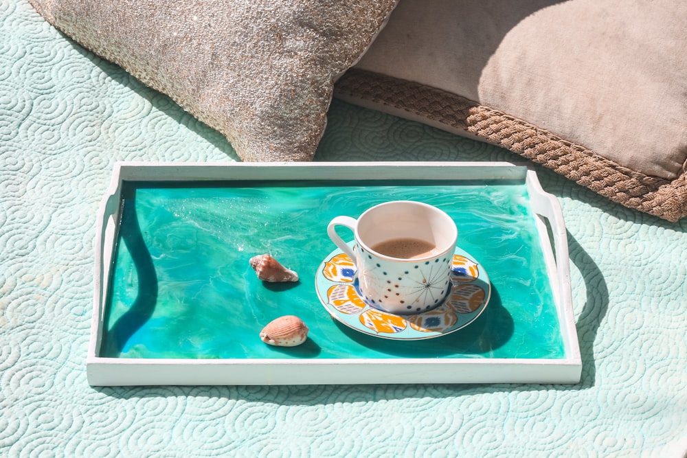 white ceramic mug on white serving tray