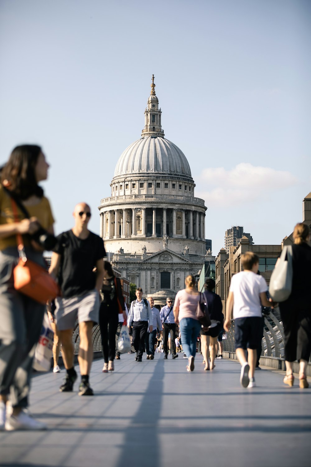 people walking on bridge