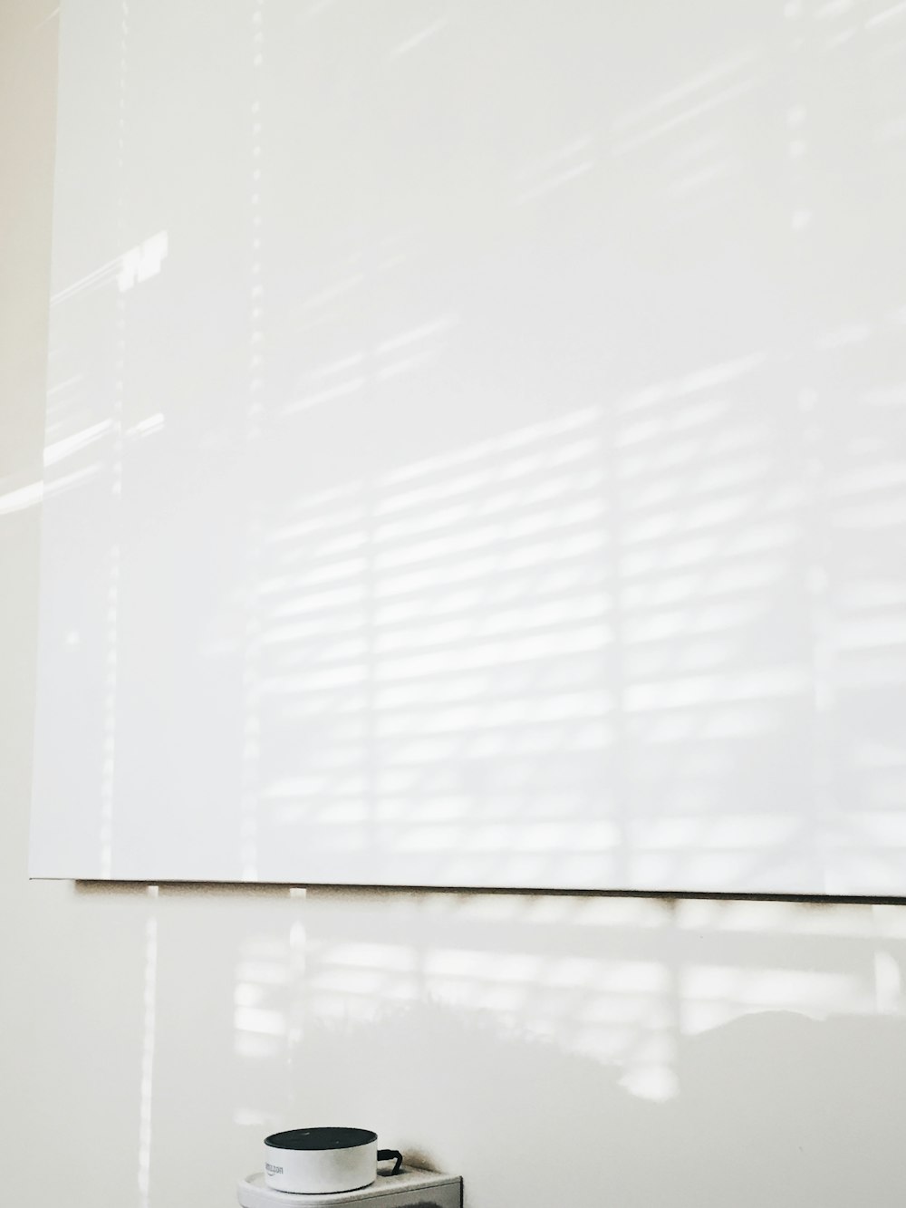 white window blinds on window