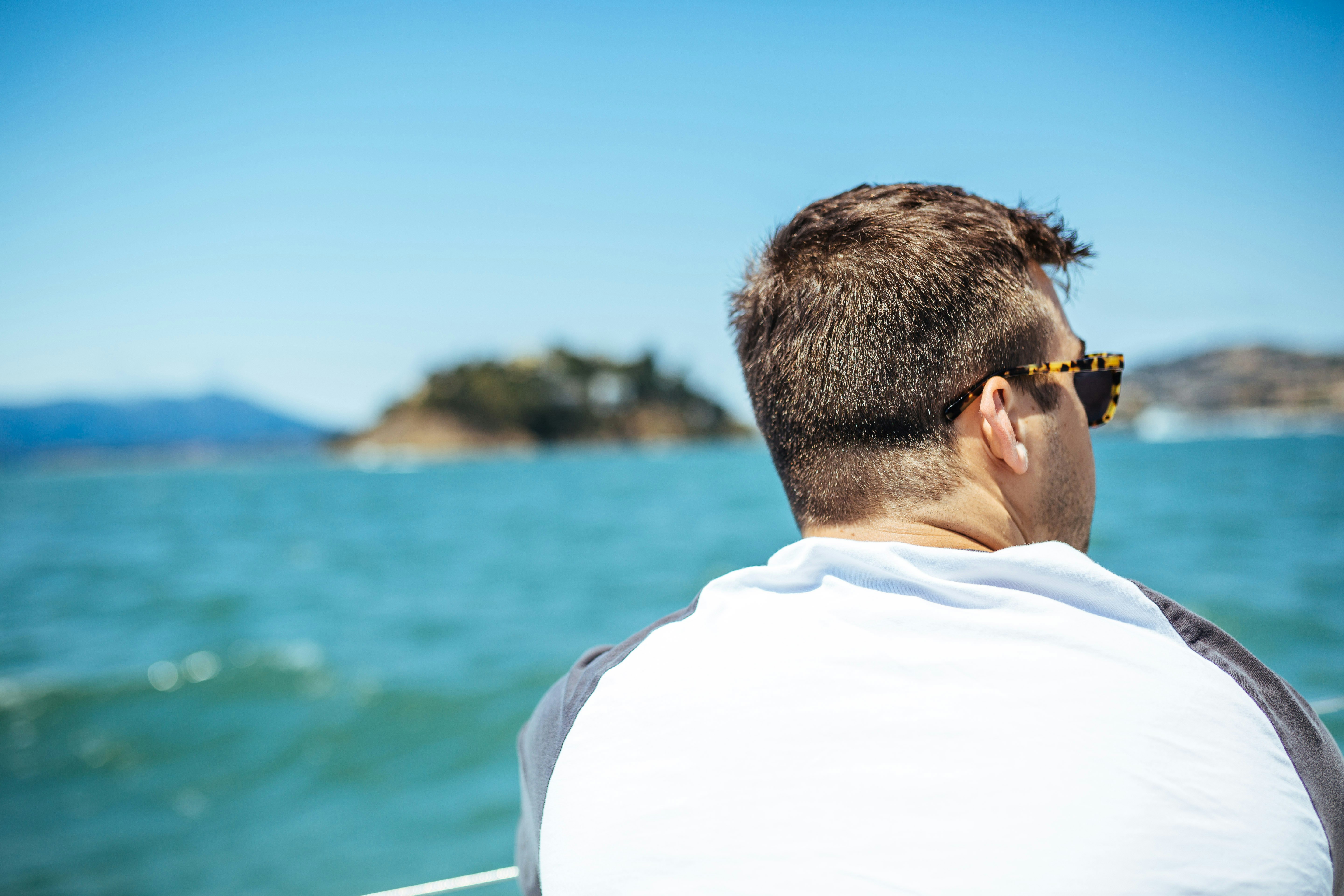 man looking at the sea