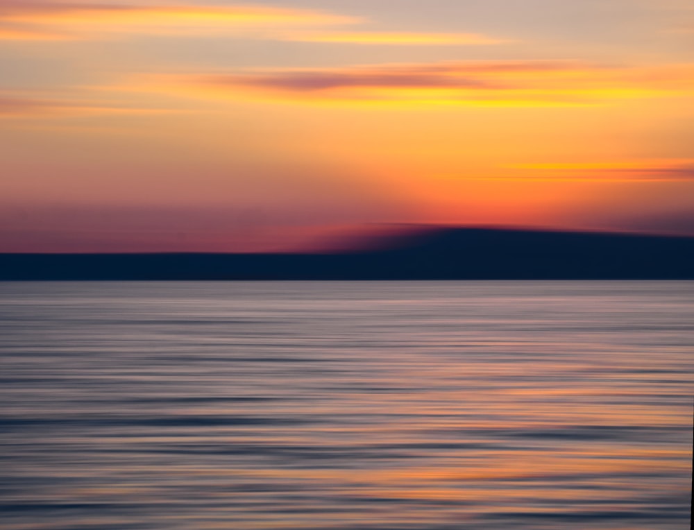 calm water during golden hour