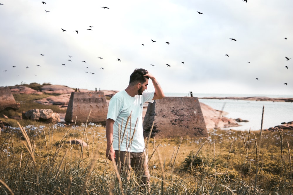 man in white crew-neck t-shirt at daytime