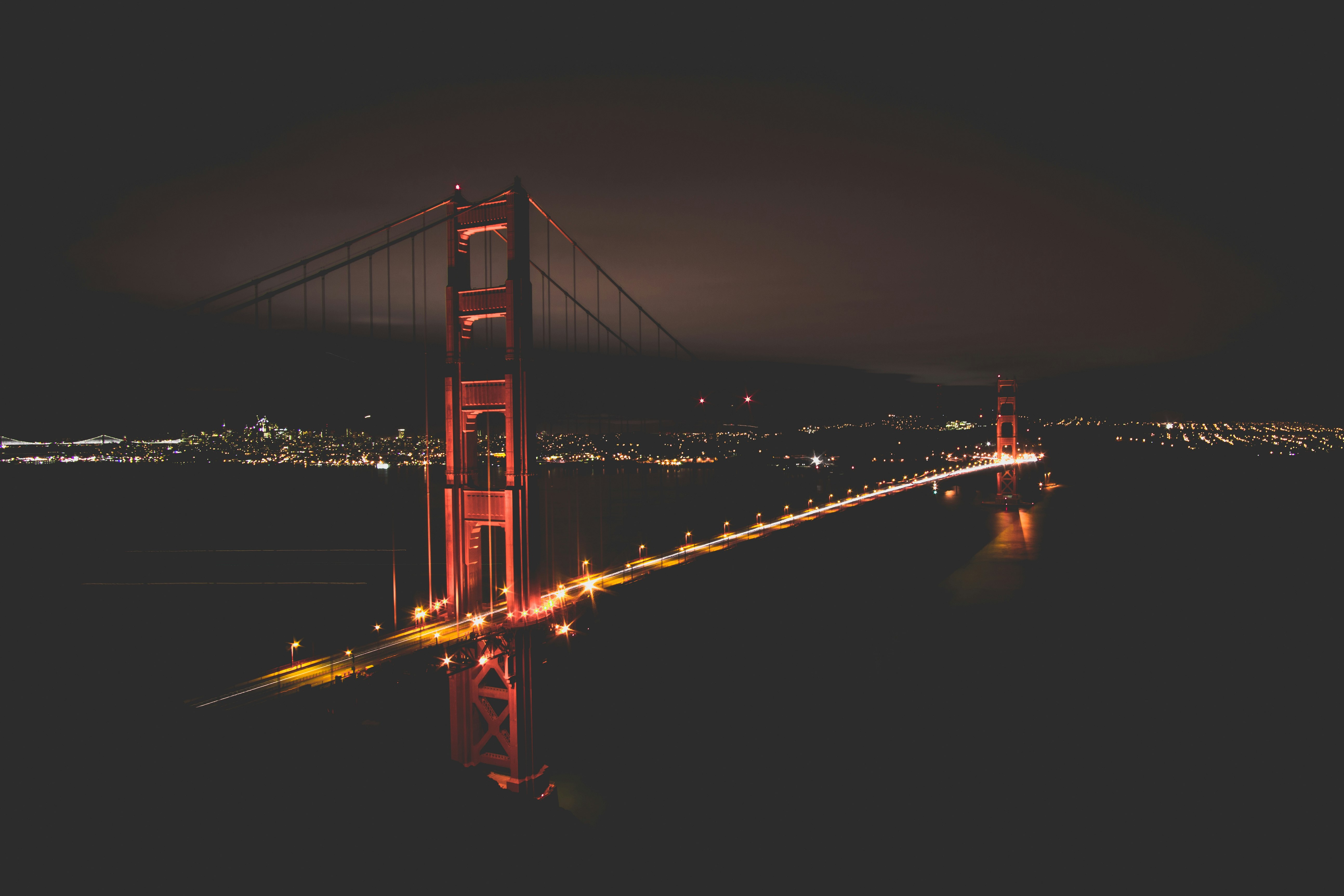 golden bridge during night time