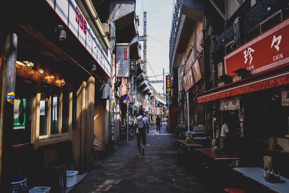 man walking on street