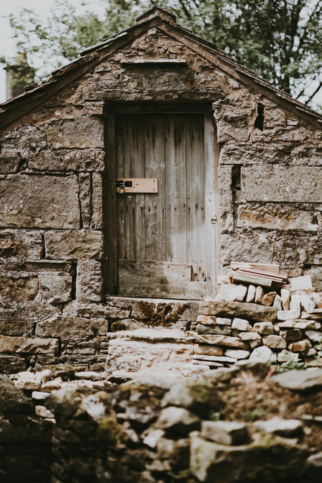 grey rock house with door close