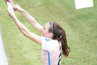 Student-athlete preparing application documents with guidance