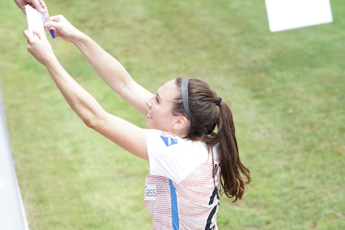 Student-athlete preparing application documents with guidance