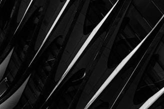 Close-up of a sleek, modern architectural detail with sharp lines and soft shadows.