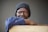 man wearing black knit cap